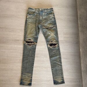 AMIRI Faded Blue Distressed Skinny Jeans